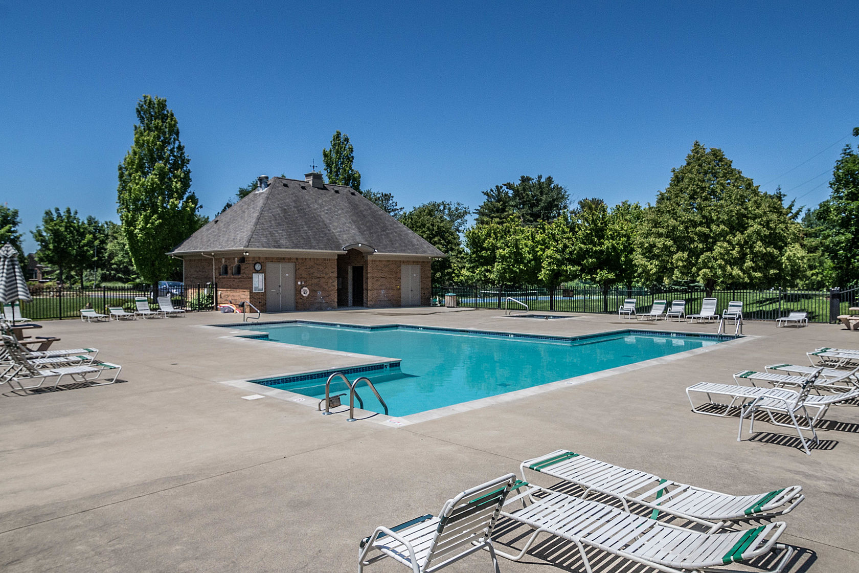 Changing rooms, pool and spa at Pine Creek Ridge in Brighton, MI