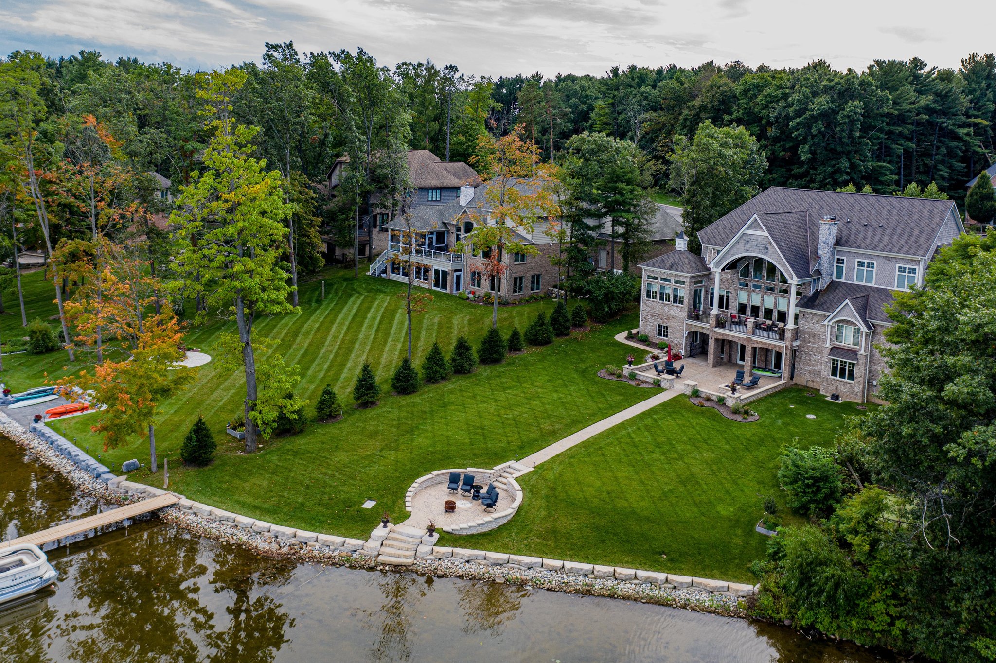 A scenic waterfront home with a fishing dock.